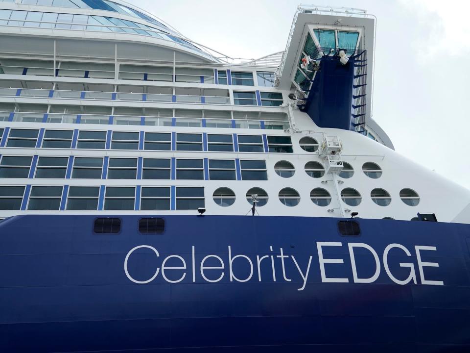 A closeup of the Celebrity Edge emblem on the cruise ship