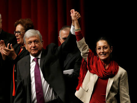 Mexico presidential candidate Andres Manuel Lopez Obrador of the National Regeneration Movement (MORENA) hold hands with Claudia Sheinbaum, coordinator of the Morena political party, before he presenting his manifesto in Mexico City, Mexico, November 20, 2017. REUTERS/Henry Romero