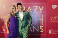 <p>Director Jon M. Chu and wife Kristin Hodge pose for photographers at the Singapore premiere of ‘Crazy Rich Asians’ on 21 August 2018. (PHOTO: Yahoo Lifestyle Singapore) </p>