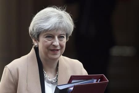 Britain's Prime Minister Theresa May leaves 10 Downing Street, to head for the House of Commons, in central London, Britain April 19, 2017. REUTERS/Stefan Wermuth