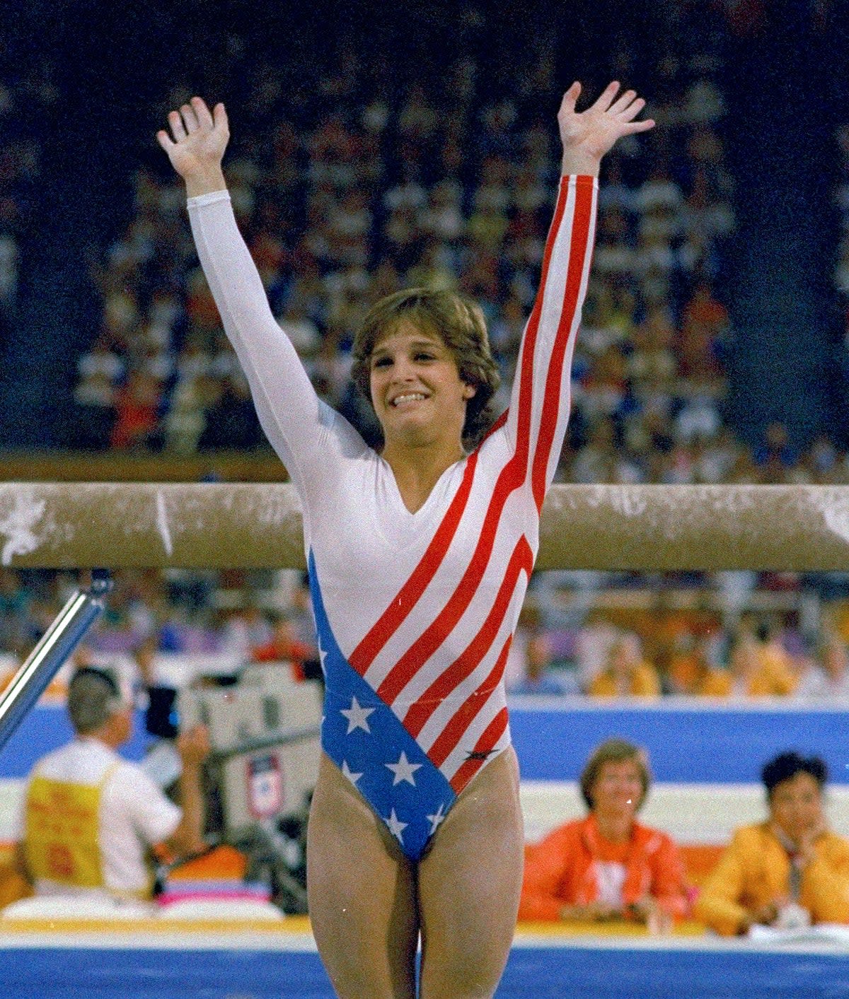 Mary Lou Retton reacts to applause after her performance at the Summer Olympics in Los Angeles on Aug. 3, 1984 (1984 AP)