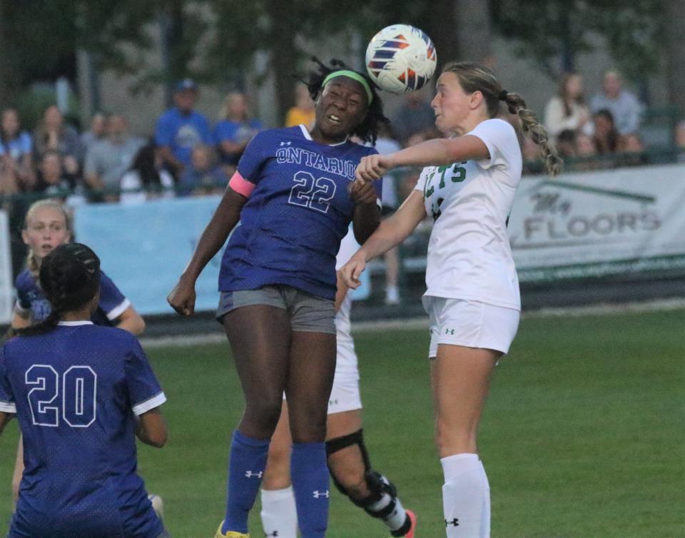 Ontario's KaMashya Shaw and Clear Fork's Ashtyn Wine fight for the ball during the Warriors' 2-1 victory over the Colts on Wednesday night.