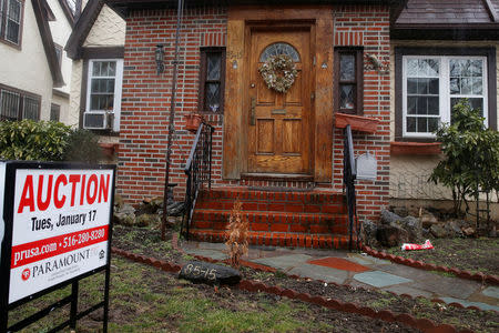 A childhood home of U.S. President-elect Donald Trump is seen with an auction sign in the Queens borough of New York, U.S., January 17, 2017. REUTERS/Shannon Stapleton