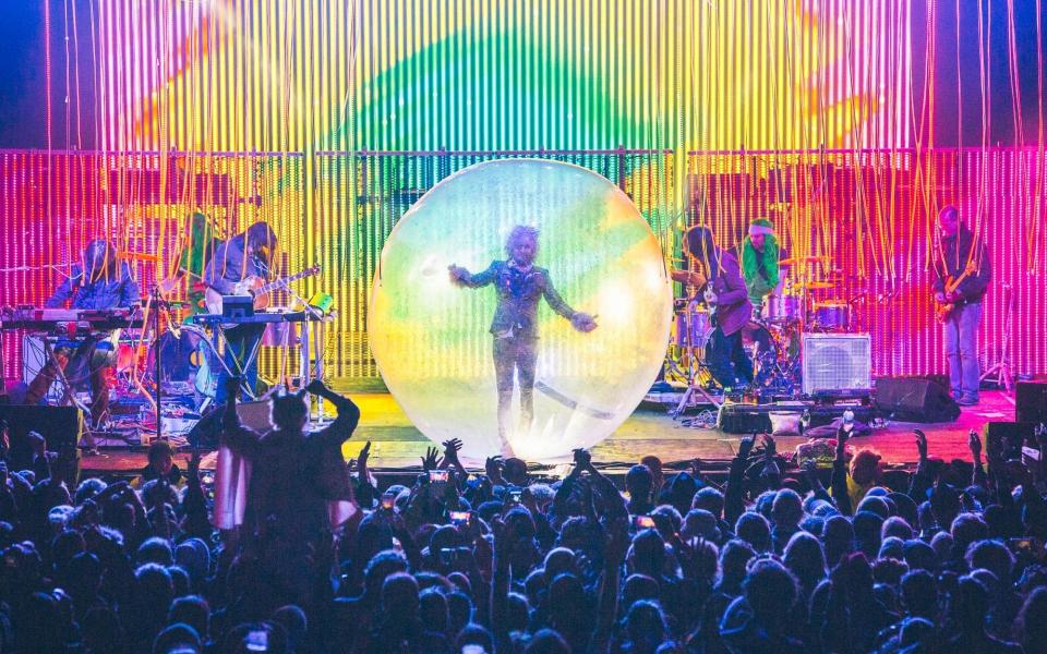 Wayne Coyne has a habit of crowd surfing in an inflatable plastic sphere - Fanatic/Festival No.6