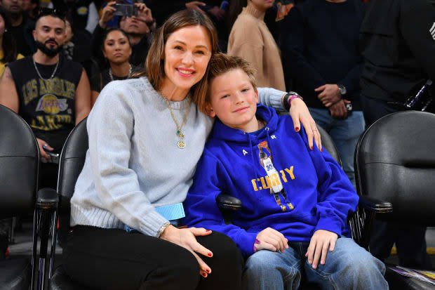 LOS ANGELES, CALIFORNIA - MARCH 05: Jennifer Garner and her son Samuel Garner Affleck attend a basketball game between the Los Angeles Lakers and the Golden State Warriors at Crypto.com Arena on March 05, 2023 in Los Angeles, California. NOTE TO USER: User expressly acknowledges and agrees that, by downloading and or using this photograph, User is consenting to the terms and conditions of the Getty Images License Agreement. (Photo by Allen Berezovsky/Getty Images)<p><a href="https://www.gettyimages.com/detail/1471501591" rel="nofollow noopener" target="_blank" data-ylk="slk:Allen Berezovsky/Getty Images;elm:context_link;itc:0;sec:content-canvas" class="link ">Allen Berezovsky/Getty Images</a></p>