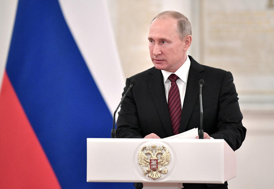 Russian President Vladimir Putin talks to senior military officers in the Kremlin in Moscow on Oct. 26. (Photo: Alexei Nikolsky, Kremlin Pool Photo via AP)