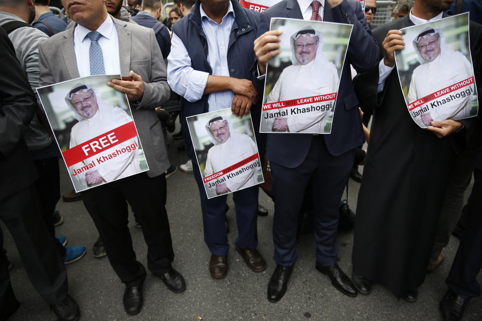 Members of the Turkish-Arab journalist association hold posters with photos of missing Saudi writer Jamal Khashoggi as they hold a protest near the Saudi Arabia Consulate in Istanbul on Monday. (Photo: Lefteris Pitarakis/AP)