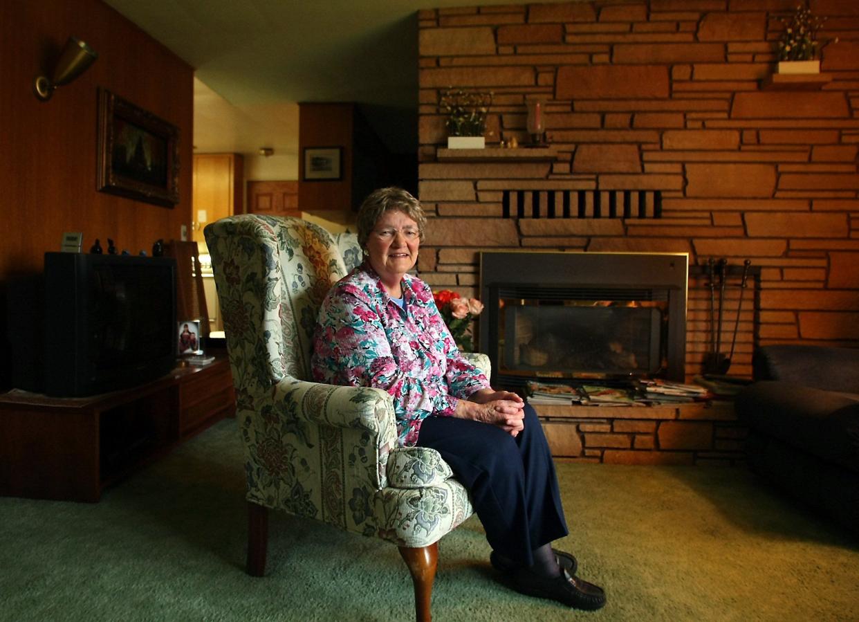 Carolyn Powers, photographed here at her Port Orchard home after her retirement in 2013, passed away at age 98 in February. Power worked for South Kitsap schools for more than two decades and served for 26 years on the Port Orchard City Council.