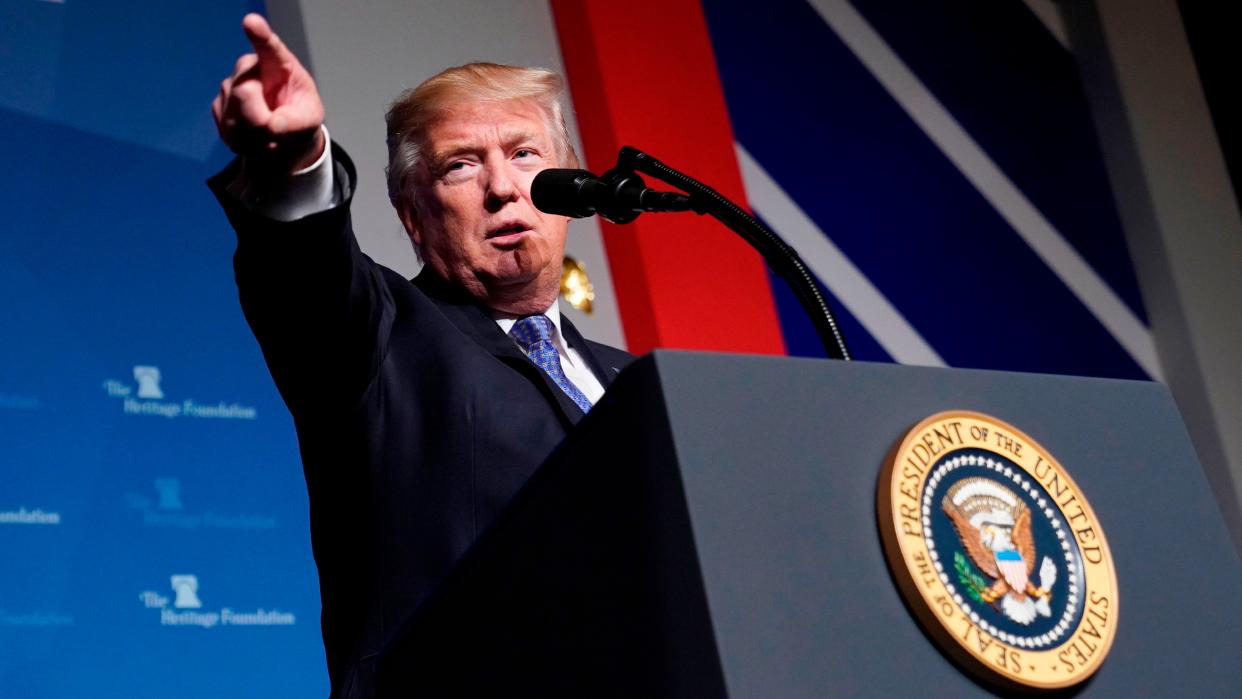  Donald Trump gives a speech on tax reform at the Heritage Foundation's President's Club Meeting at a hotel in Washington, DC, on October 17, 2017. 