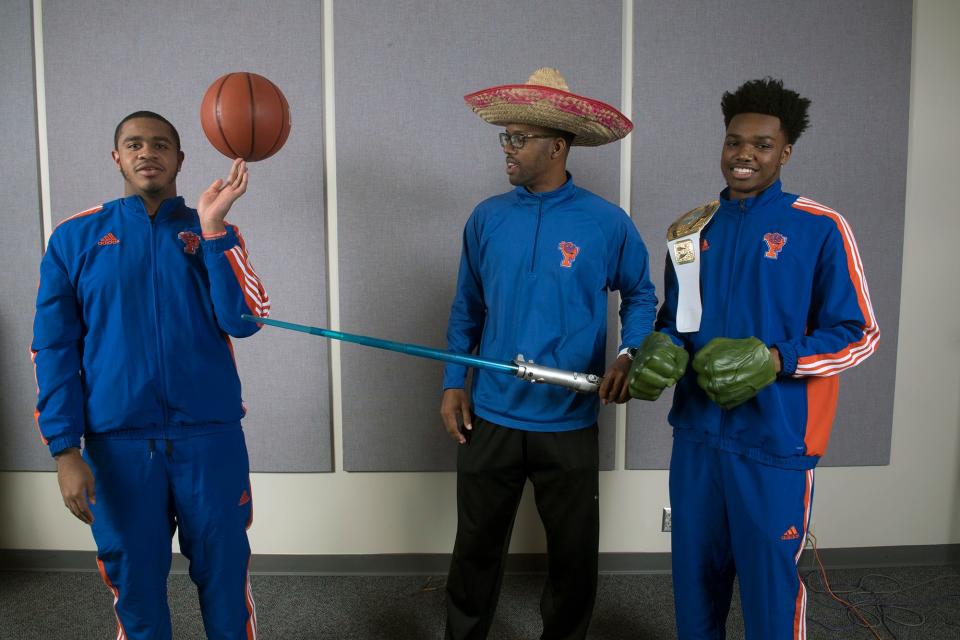 From the left, Marquise McClean, Clovis Gallon and Clovis Gallon Jr., of York High boys basketball team, pose during the 2018-19 GameTimePa YAIAA Winter Media Day Sunday November 11, 2018.