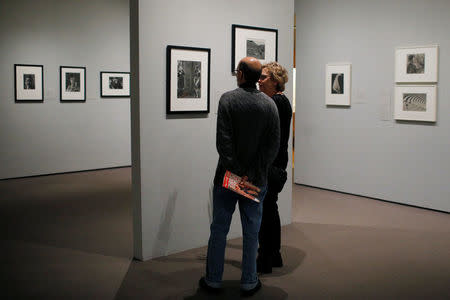 Visitors look at the exhibit "Imogen Cunningham: In Focus" at the Museum of Fine Arts, Boston, in Boston, Massachusetts, U.S., April 26, 2017. REUTERS/Brian Snyder