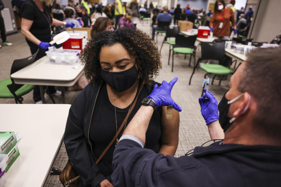 Latiah Haley receives a dose of the Johnson & Johnson COVID-19 vaccine, the newest vaccine approved by the U.S. FDA for emergency use, at an event put on by the Thornton Fire Department on March 6, 2021 in Thornton, Colorado. (Michael Ciaglo/Getty Images)