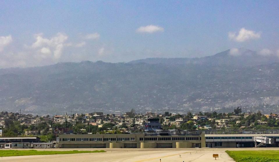 A view of Toussaint Louverture International Airport, foreground, in Port-au-Prince, Haiti. Commercial flights in and out of the airport have been suspended since early March 2024 when armed groups targeted the facility and nearby domestic airport.
