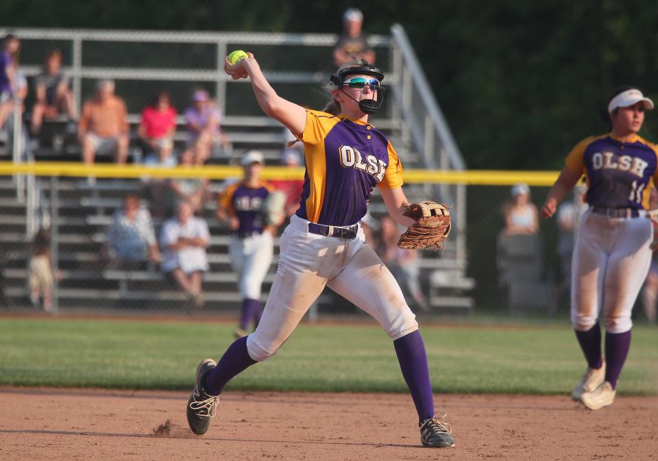 OLSH's Morgan O'Brien fires the ball to first base after fielding a line drive during the sixth inning of the WPIAL 2A Semifinals game against Laurel Wednesday evening at North Allegheny High School.