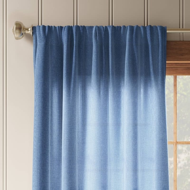 The blue denim curtain panel
