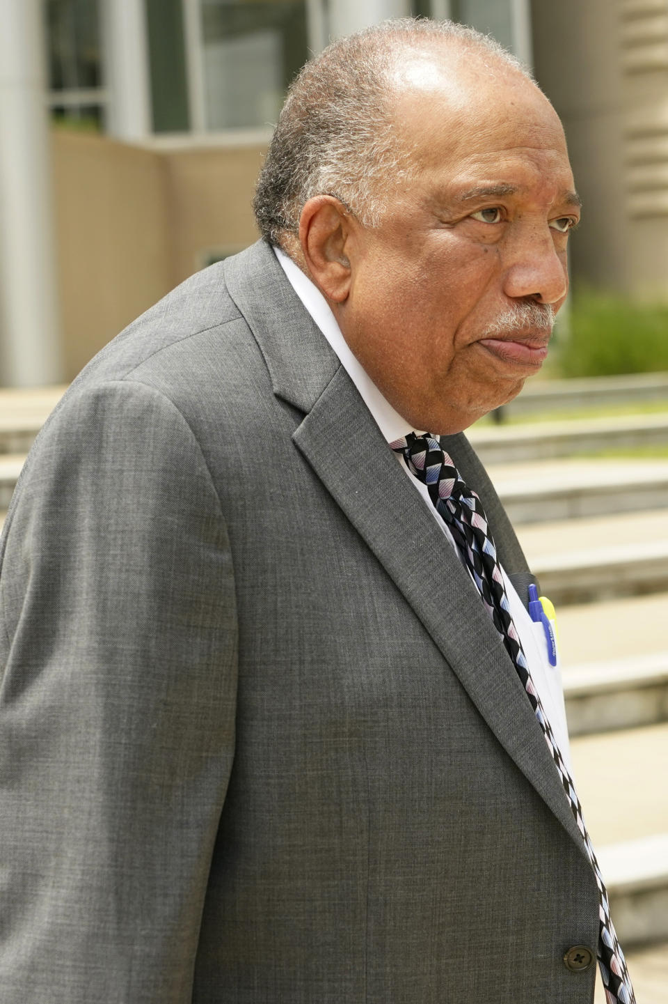 Civil rights attorney Carroll Rhodes, exits the Thad Cochran United States Courthouse in Jackson, Miss., Monday, May 22, 2023, after a day in federal court where a judge heard arguments about a Mississippi law that would create a court system with judges who would be appointed rather than elected. (AP Photo/Rogelio V. Solis)