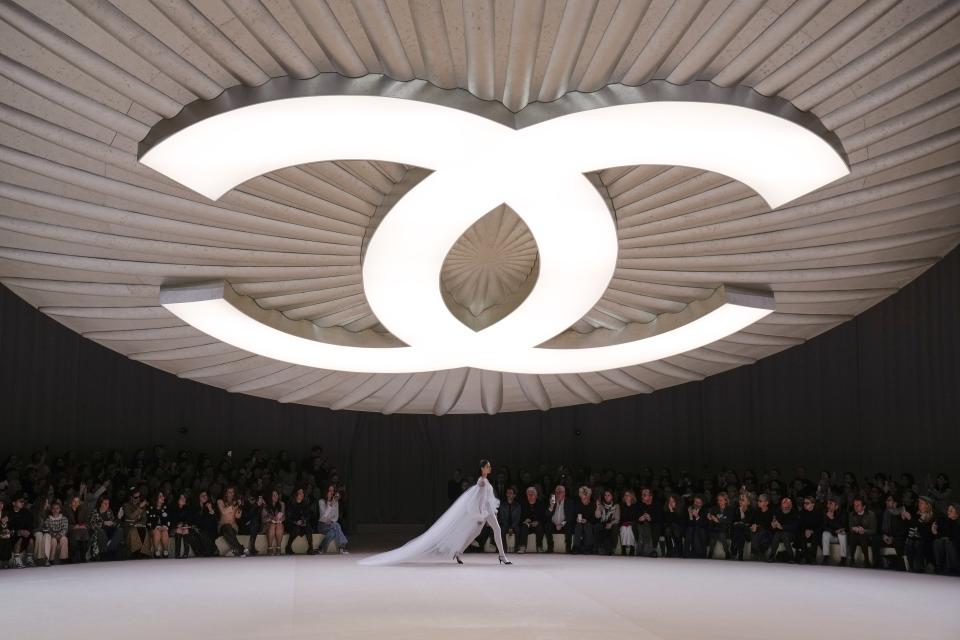 A model wears a creation for Chanel as part of the Haute Couture Spring-Summer 2024 collection presented in Paris, Tuesday, Jan. 23, 2024. (AP Photo/Christophe Ena)