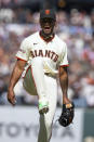 San Francisco Giants pitcher Camilo Doval reacts to getting the final out against the San Diego Padres during the ninth inning of a baseball game, Sunday, April 7, 2024, in San Francisco. (AP Photo/D. Ross Cameron)