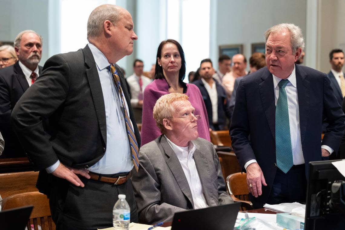 Alex Murdaugh speaks with his attorneys during his trial for murder at the Colleton County Courthouse on Wednesday, Feb. 1, 2023. Joshua Boucher/The State/Pool