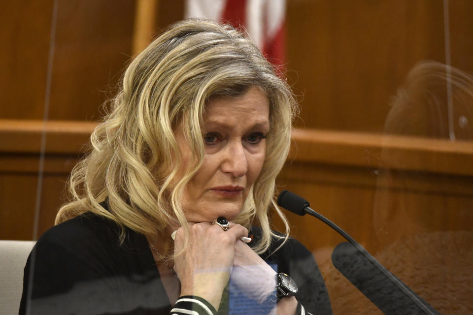 Ruth Vorwald gets emotional as she describes the scene where the late Julie Jensen was found dead while testifying in Mark Jensen's trial at the Kenosha County Courthouse on Wednesday, Jan. 11, 2023, in Kenosha, Wis. The Wisconsin Supreme Court ruled in 2021 that Jensen deserved a new trial in the 1998 death of his wife Julie Jensen, who was poisoned with antifreeze. (Sean Krajacic/The Kenosha News via AP, Pool)