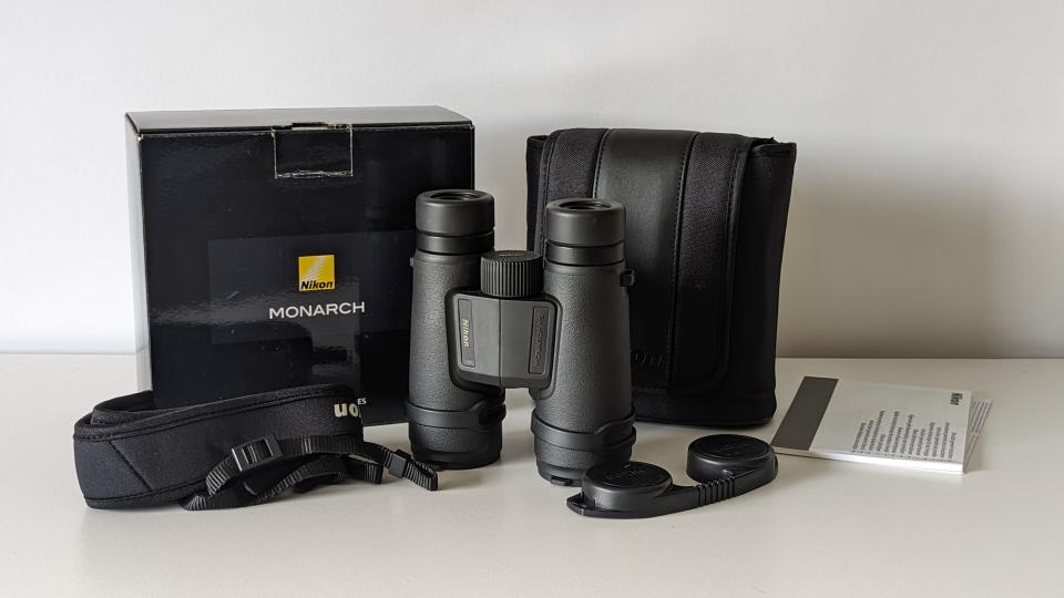 Nikon Monarch M5 12x42 binoculars on a white table