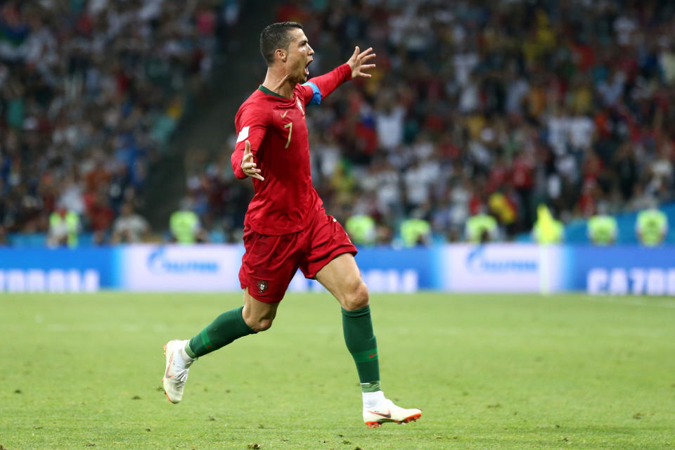 Cristiano Ronaldo celebrates his stunning free kick for Portugal against Spain at the 2018 World Cup. (Getty)