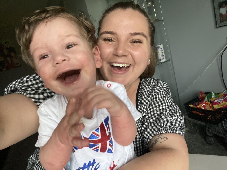 Tommy, pictured with his mum, is now thriving after five months in hospital. (Lauren Beckett/SWNS)