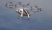 A Volocopter air-taxi performs a flight over Le Bourget airport