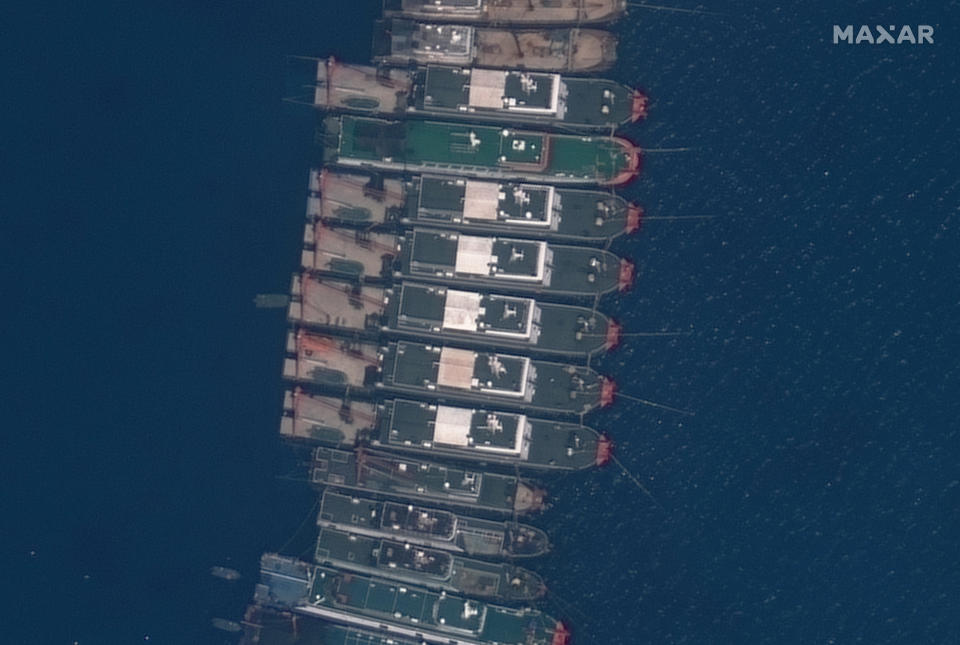 This satellite image provided by Maxar Technologies shows Chinese vessels anchored the Whitsun Reef located in the disputed South China Sea. Tuesday, March 23, 2021. The United States said Tuesday it’s backing the Philippines in a new standoff with Beijing in the disputed South China Sea, where Manila has asked a Chinese fishing flotilla to leave a reef. China ignored the call, insisting it owns the offshore territory. (©2021 Maxar Technologies via AP)