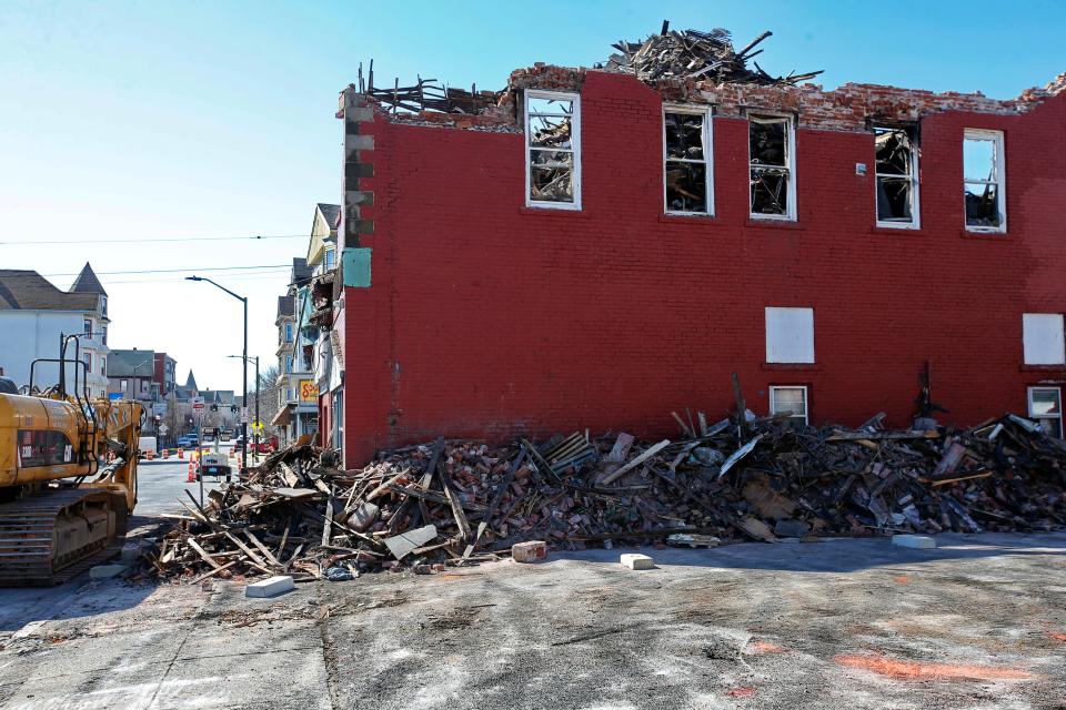 The partially demolished remnants of the site of a fatal fire of an apartment complex on Acushnet Avenue in New Bedford.