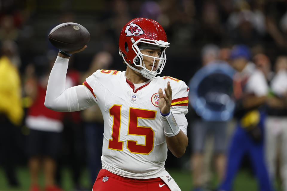 Kansas City Chiefs quarterback Patrick Mahomes (15) sets back to pass in the first half of a preseason NFL football game against the New Orleans Saints in New Orleans, Sunday, Aug. 13, 2023. (AP Photo/Butch Dill)