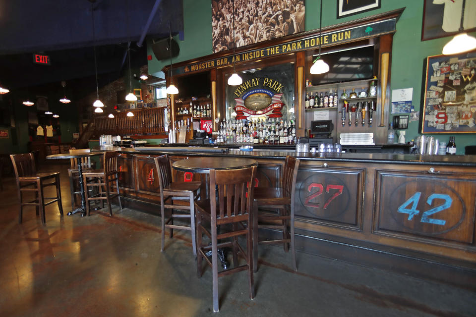 This June 25, 2020, photo shows the interior of the Bleacher Bar in Boston. Tucked under the center field seats at Fenway Park, down some stairs from Lansdowne Street in an area previously used as the visiting team’s batting cage, is a sports bar that is preparing to reopen from the coronavirus shutdown. If Major League Baseball’s plans remain on schedule, it may be one of the few places fans will be able to watch a game in person this season. (AP Photo/Elise Amendola)