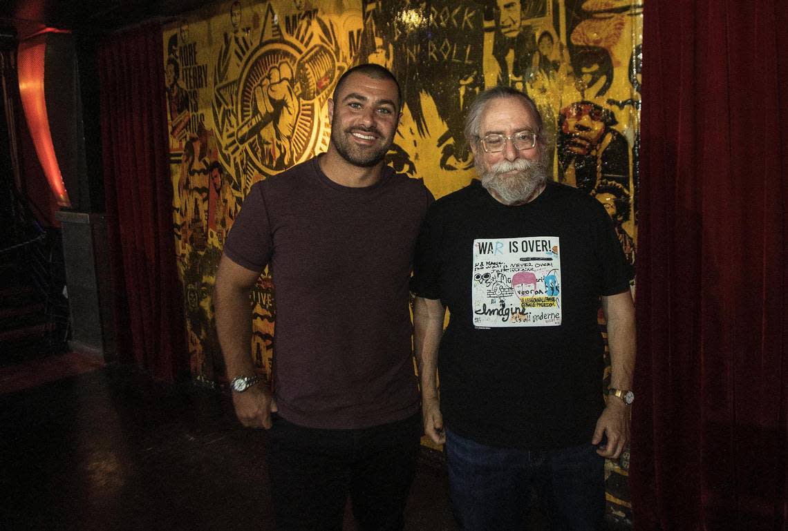 Woody Graber, right, a music industry veteran of some 40 years in Miami-Dade and Broward, is seen here with Jarred John, chief operating officer and owner of Damn Good Hospitality, at the Revolution Live music club in Fort Lauderdale on Wednesday, May 31, 2022. The pop band Chvrches performed that night.