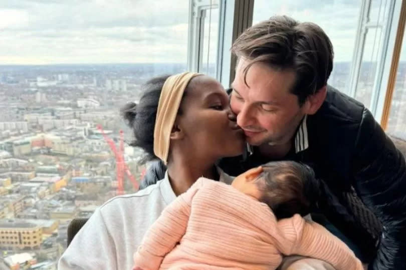 Oti Mabuse with her husband and their baby daughter