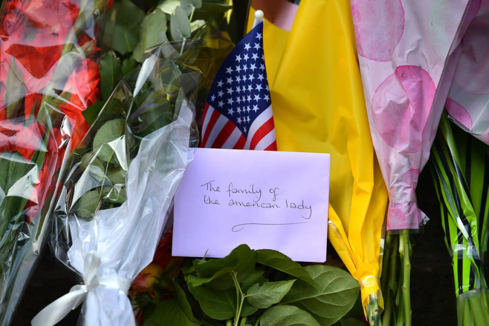 <p>London knife attack</p><p>A card and U.S flag is left with flowers at the scene of a stabbing in which one woman was murdered, on August 5, 2016 in London, England. (Carl Court/Getty Images)</p>