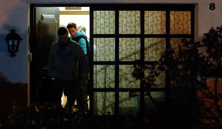 German police officers leave the house believed to belong to the parents of crashed Germanwings flight 4U 9524 co-pilot Andreas Lubitz in Montabaur, March 26, 2015. REUTERS/Kai Pfaffenbach