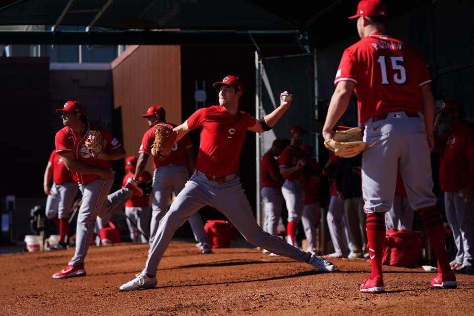 Cincinnati Reds starting pitcher Nick Lodolo (40) delivers a pitch in the bullpen during spring training workouts, Wednesday, Feb. 14, 2024, at the team’s spring training facility in Goodyear, Ariz.