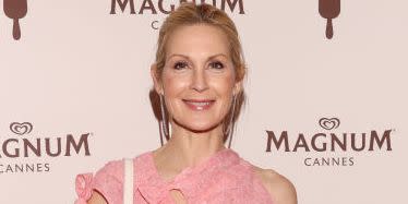 kelly rutherford wears a pink cutout dress
