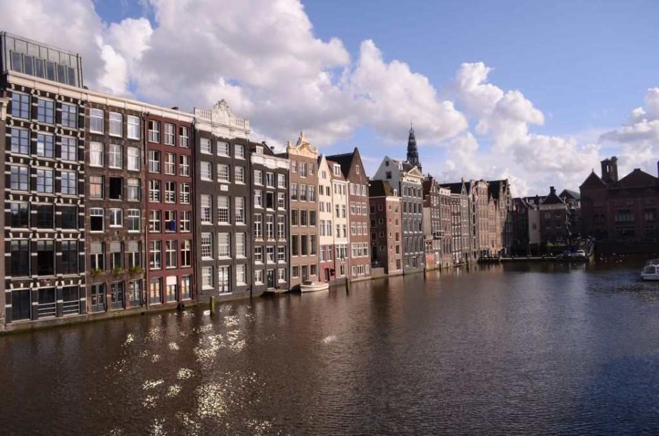 A cruise takes me to some of the oldest canals of Amsterdam. I see houses and monuments that are more than 500 years old, hidden behind the rustling leaves of green trees.