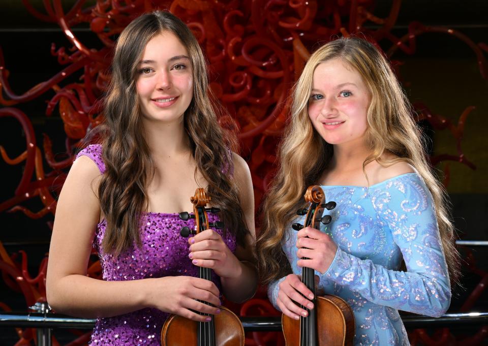 Alina Baron and Whitney Baron, violinists, pose for photos for the 2023 Salute to Youth Portraits at Abravanel Hall in Salt Lake City on Wednesday, Oct. 4, 2023. | Scott G Winterton, Deseret News