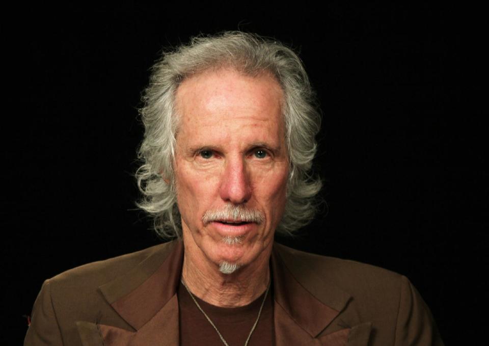 This April 17, 2013 photo shows fFormer Doors drummer John Densmore in New York. The 68-year drummer is no stranger to chronicling his former band. He wrote The New York Times best-seller, “Riders on the Storm” in 1991. He keeps the spirit of Jim Morrison alive in his latest book, "The Doors Unhinged: Jim Morrison's Legacy Goes on Trial." (AP Photo/John Carucci)
