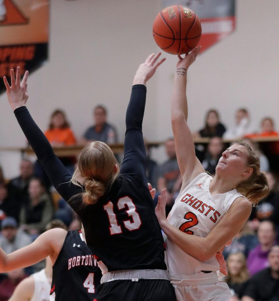 Kaukauna High School’s Alexa Kinas (2) against Hortonville High School’s Mikayla Werner (13) during their girls basketball game on Friday, December 16, 2022, in Kaukauna, Wis. Kaukauna defeated Hortonville 70-59. Wm. Glasheen USA TODAY NETWORK-Wisconsin
