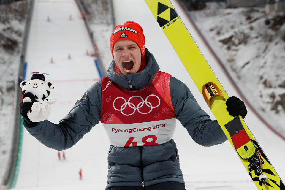 <p>Germany’s Andreas Wellinger celebrates during the victory ceremony after winning the men’s normal hill individual ski jumping event during the Pyeongchang 2018 Winter Olympic Games on February 10, 2018, in Pyeongchang. / AFP PHOTO / Odd ANDERSEN </p>