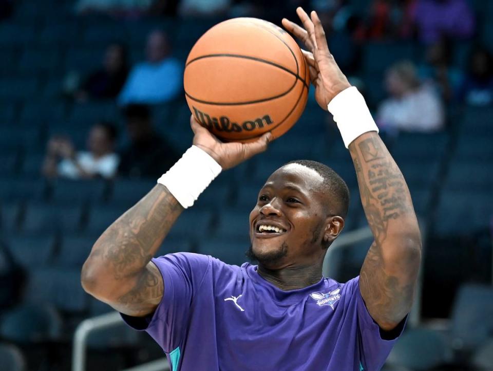 Charlotte Hornets guard Terry Rozier laughs as he jokes with his teammates prior to first half action against the Oklahoma City Thunder on Sunday, October 15, 2023 at Spectrum Center in Charlotte, NC.