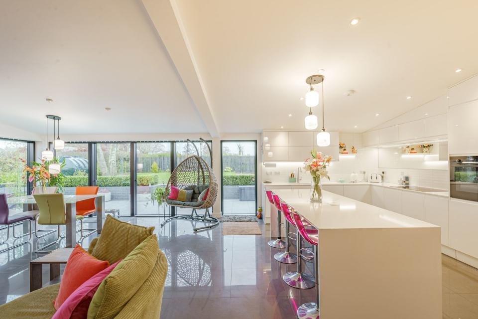 a large kitchen with a large island