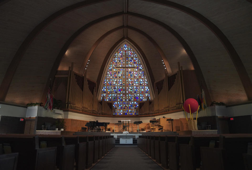 Christ Community church, which is the remnant of John Alexander Dowie's original congregation formed in the 1900s, sits in the center of Zion, Ill., on Saturday, Sept. 17, 2022. An assistant pastor at the church says the congregation now identifies as evangelical and doesn't adhere to Dowie's teachings. (AP Photo/Jessie Wardarski)