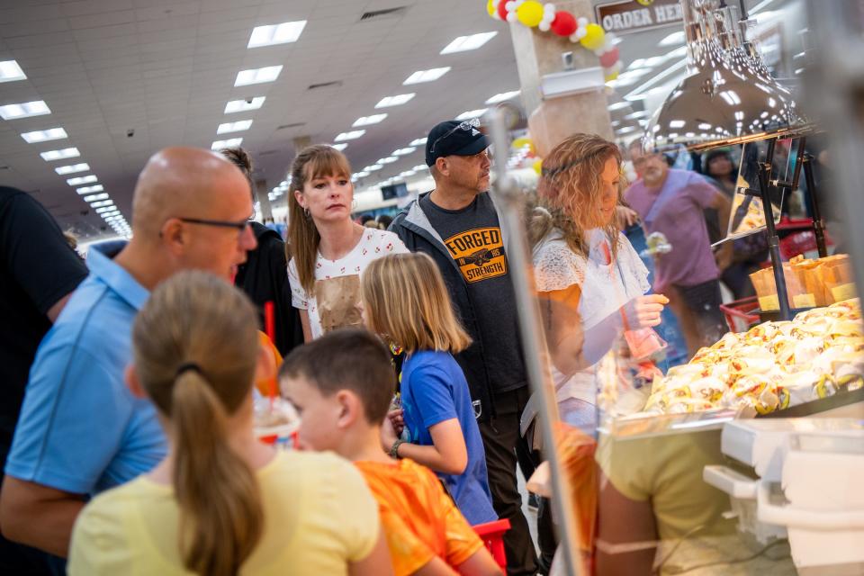 Buc-ee's customers browse the many food options at the giant convenience store in Sevierville.