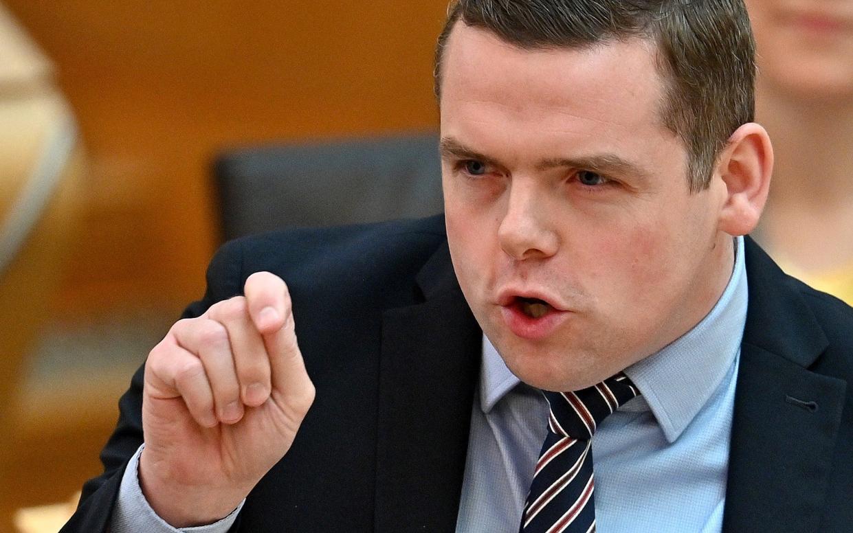 Douglas Ross hit out at the SNP for 'critical failures in guaranteeing they are on top of controlling Covid in Scotland' - Jeff J Mitchell/Pool via Reuters