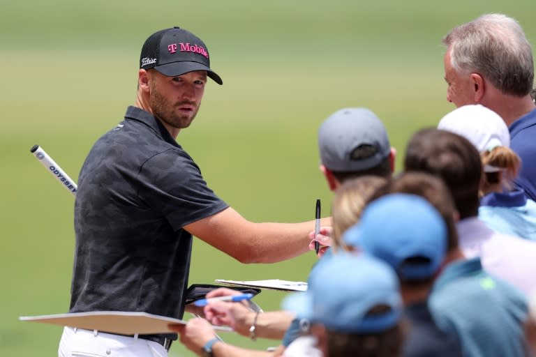 Defending US Open champion Wyndham Clark of the United States signs an autograph for a fan during a practice round ahead of the 124th US Open at Pinehurst (Gregory Shamus)