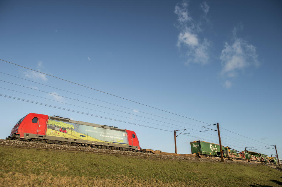 A freight train sits on the tracks after a train accident with a passenger train, on the Great Belt Bridge in Nyborg, Denmark, Wednesday, Jan. 2, 2019. A Danish passenger train apparently hit falling cargo from a passing freight train Wednesday, an accident that killed six people and injured 16 others as it crossed a bridge linking the country's islands, authorities said. Authorities said the trains were going past each other in opposite directions. Aerial TV footage showed one side of front of the passenger train had been ripped open. (Mads Claus Rasmussen/Ritzau Scanpix via AP)